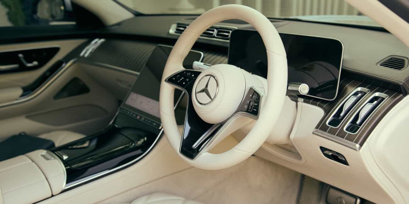 Luxury Car Rental by Carleone in Bangkok, Thailand, featuring a high-end limousine service and airport transfer.