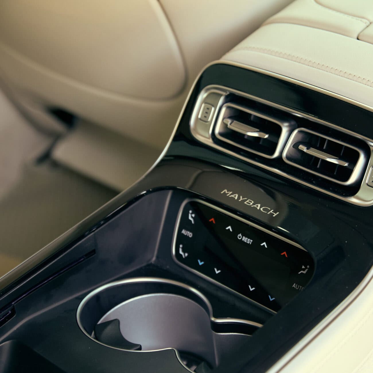 Luxurious Carleone Maybach interior showcasing advanced climate control and air vents in a premium vehicle for airpot limousine service in Bangkok, Thailand.